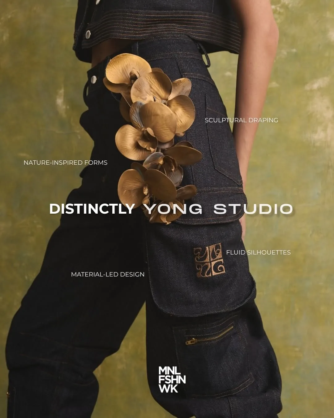 Dark denim cargo silhouette by Yong Studio with gilded orchids trailing down the hip