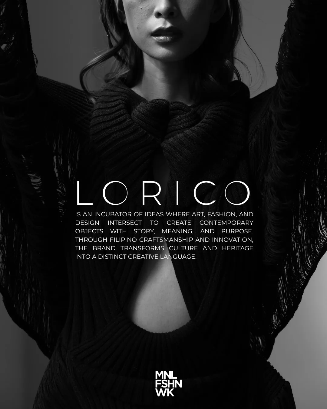 Black knit Lorico look with sculptural knots, a central cutout, and fringed sleeves